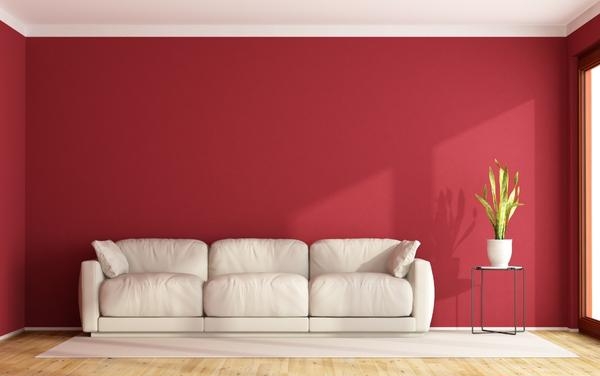 Living Room with White Sofa and Red Wallpaper