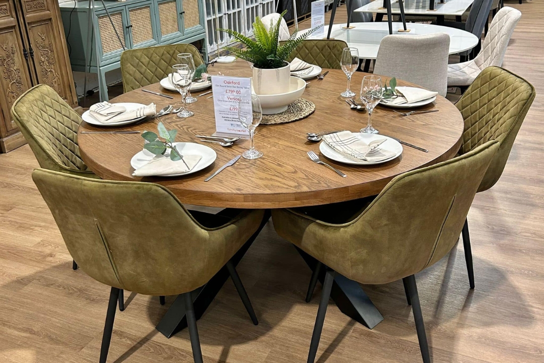 Green velvet dining chairs and round oak dining table set