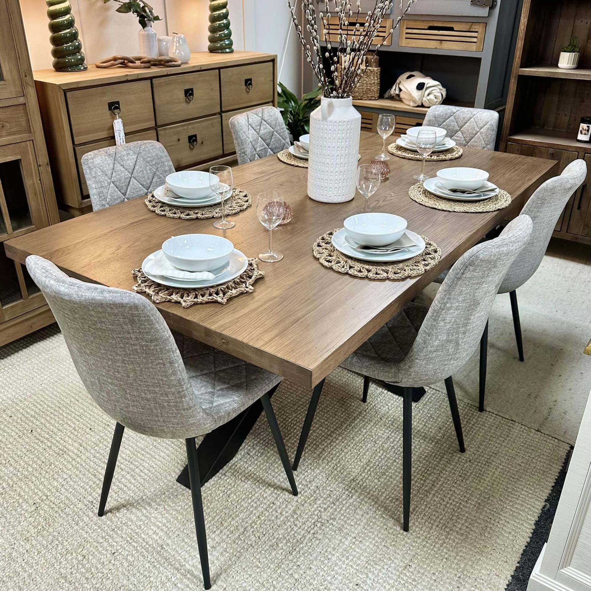 Dining area with kitchen cabinets at Furniture Outlet