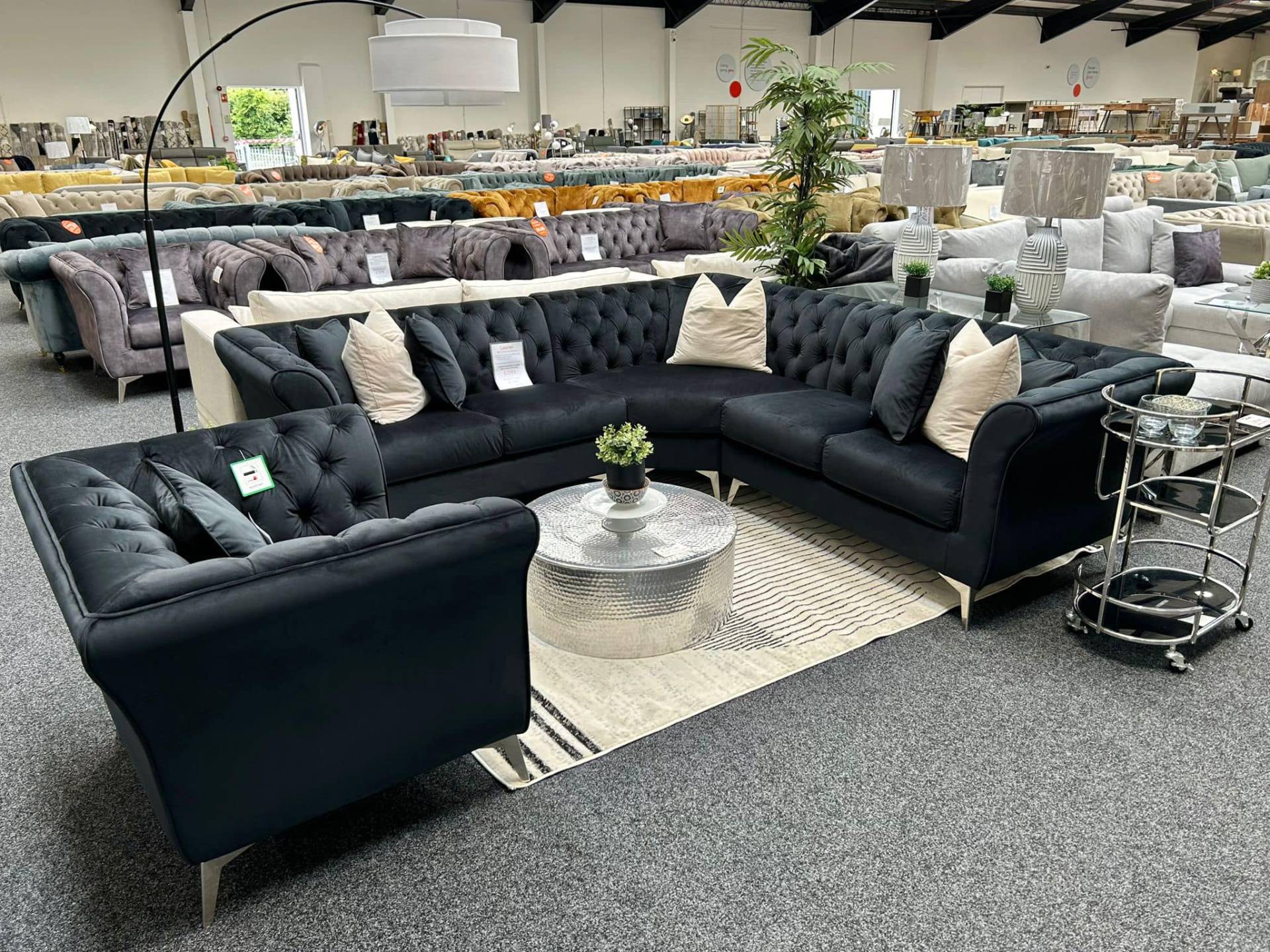 Lauren Black Velvet Armchair and Corner Sofa at Furniture Outlet Stores