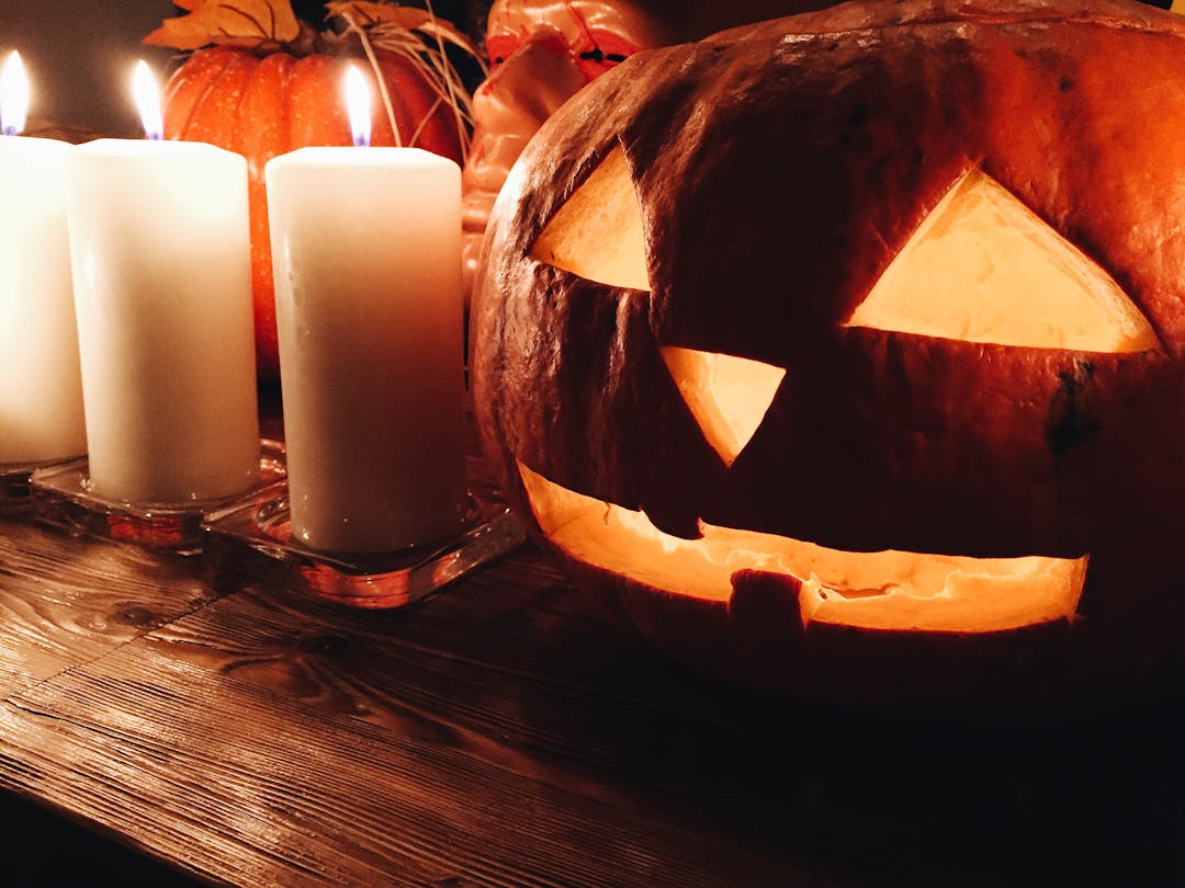 Halloween Jack-o'-lantern on wooden table