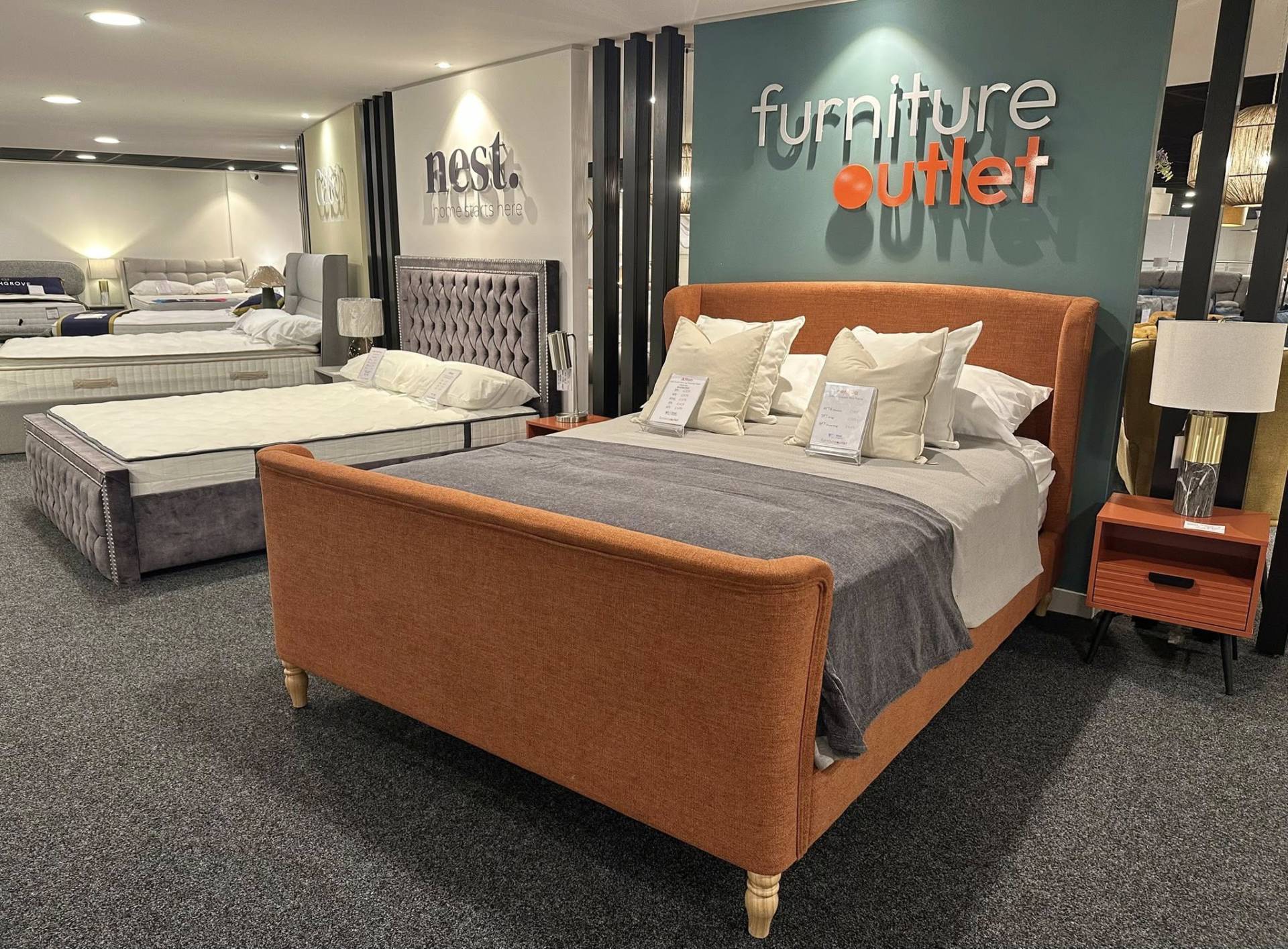 Fenella luxury copper bed frame on display at the Furniture Outlet store in Charlton