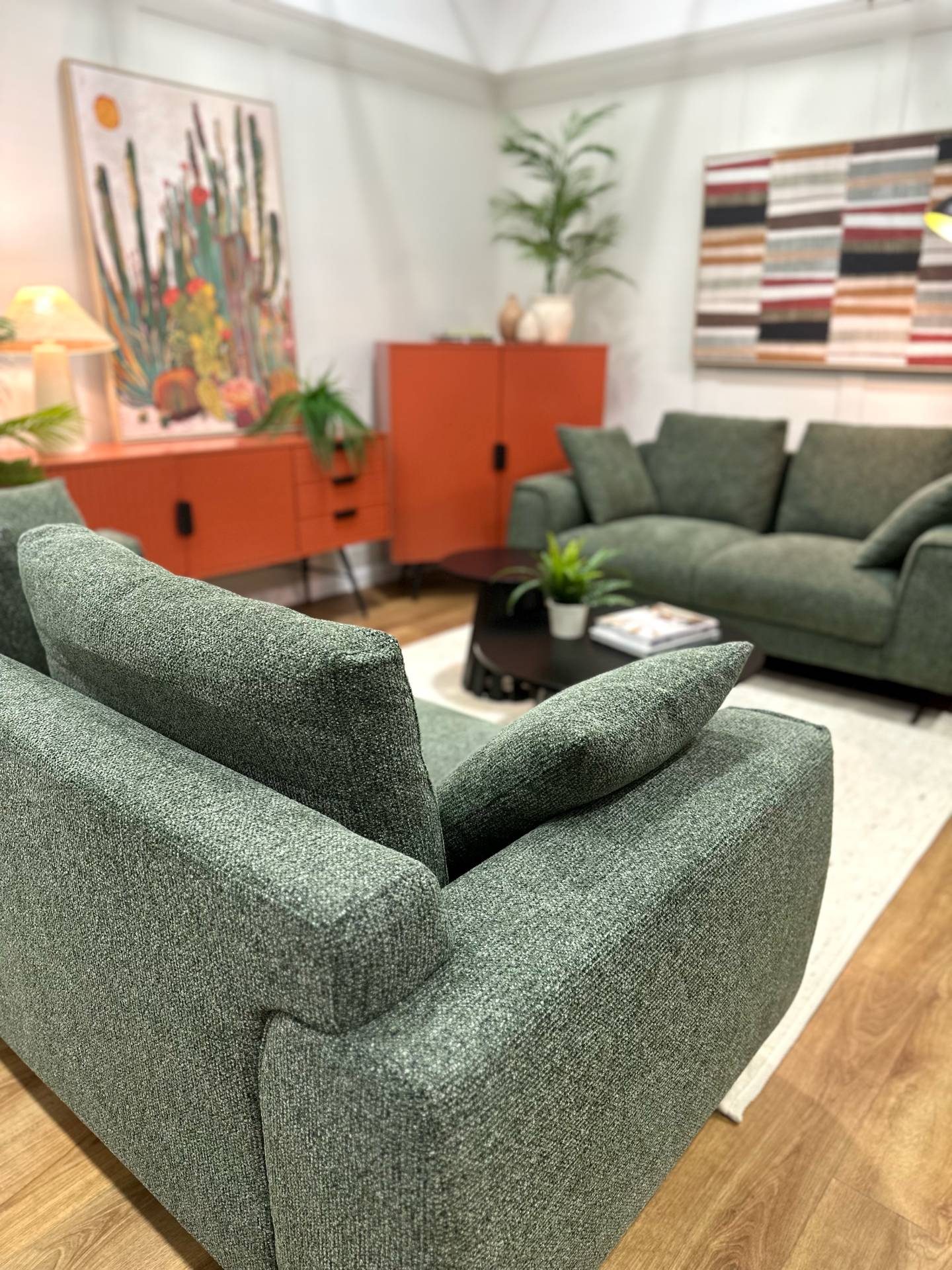 Dakota dark green sofas and Malmo terracotta sideboards