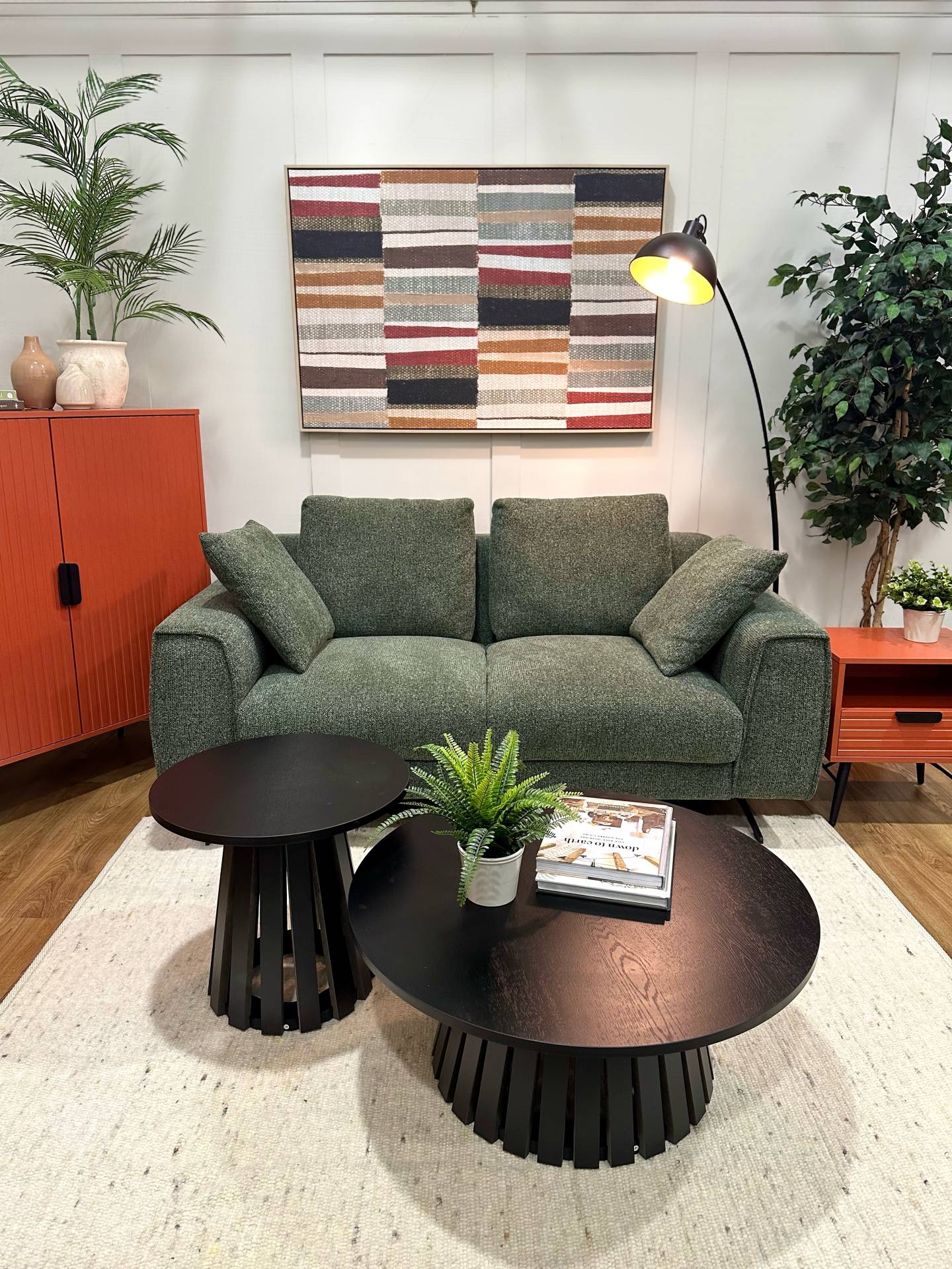 Dakota dark green sofa and Stockholm black coffee tables
