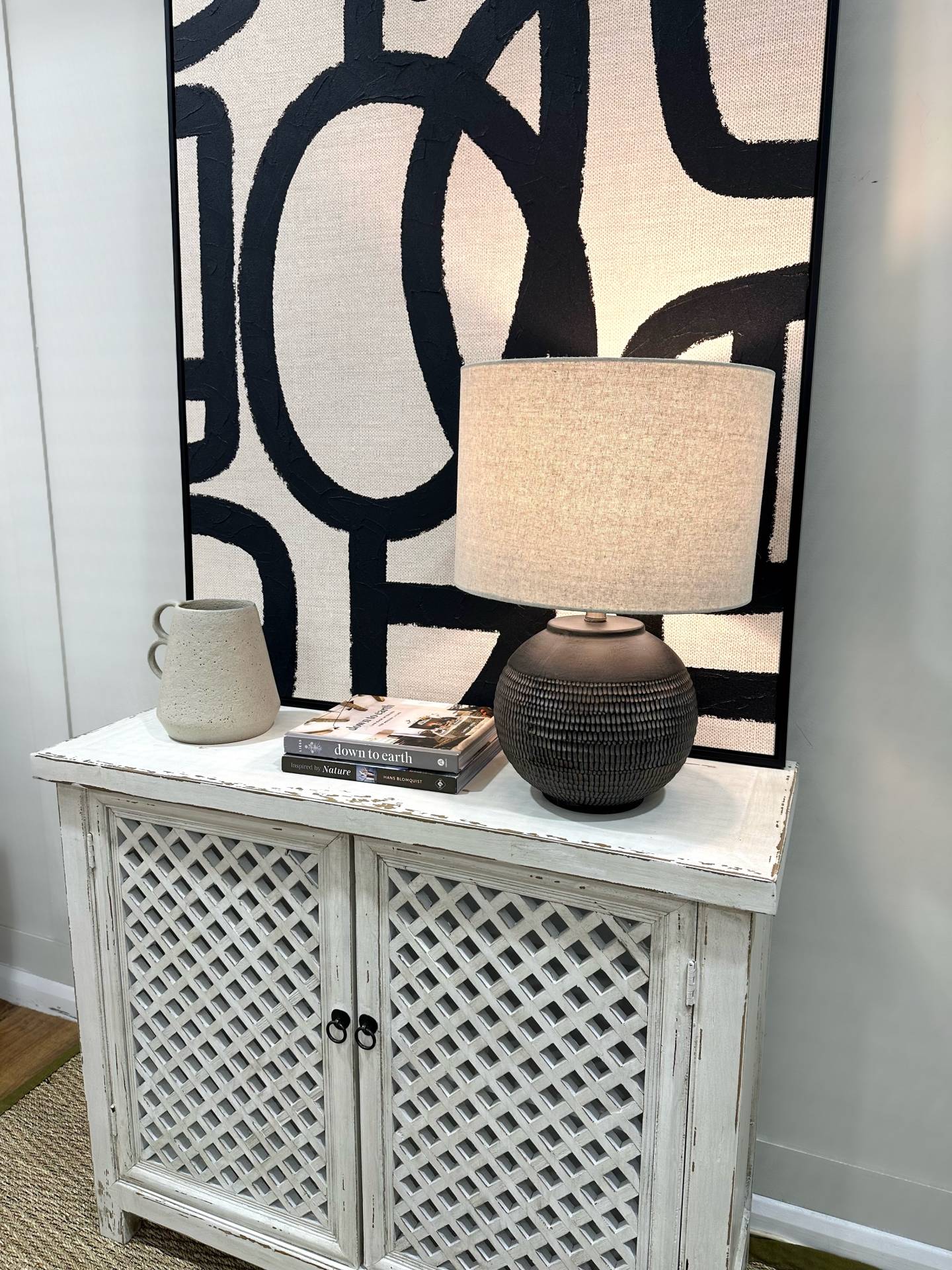 Table lamp on shabby chic cabinet