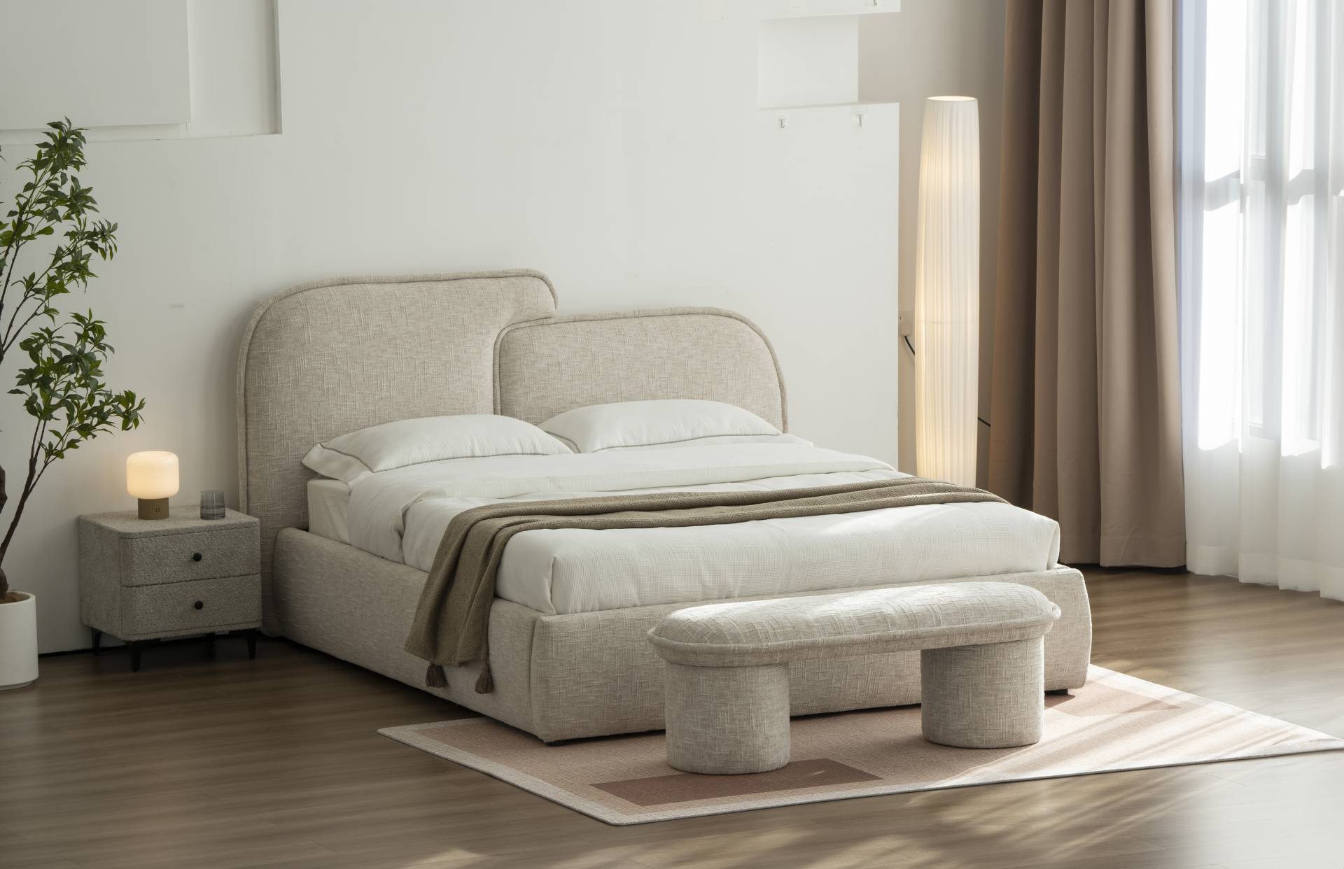 Modern Beds from Furniture Outlet, shown here with a minimalist curved headboard design