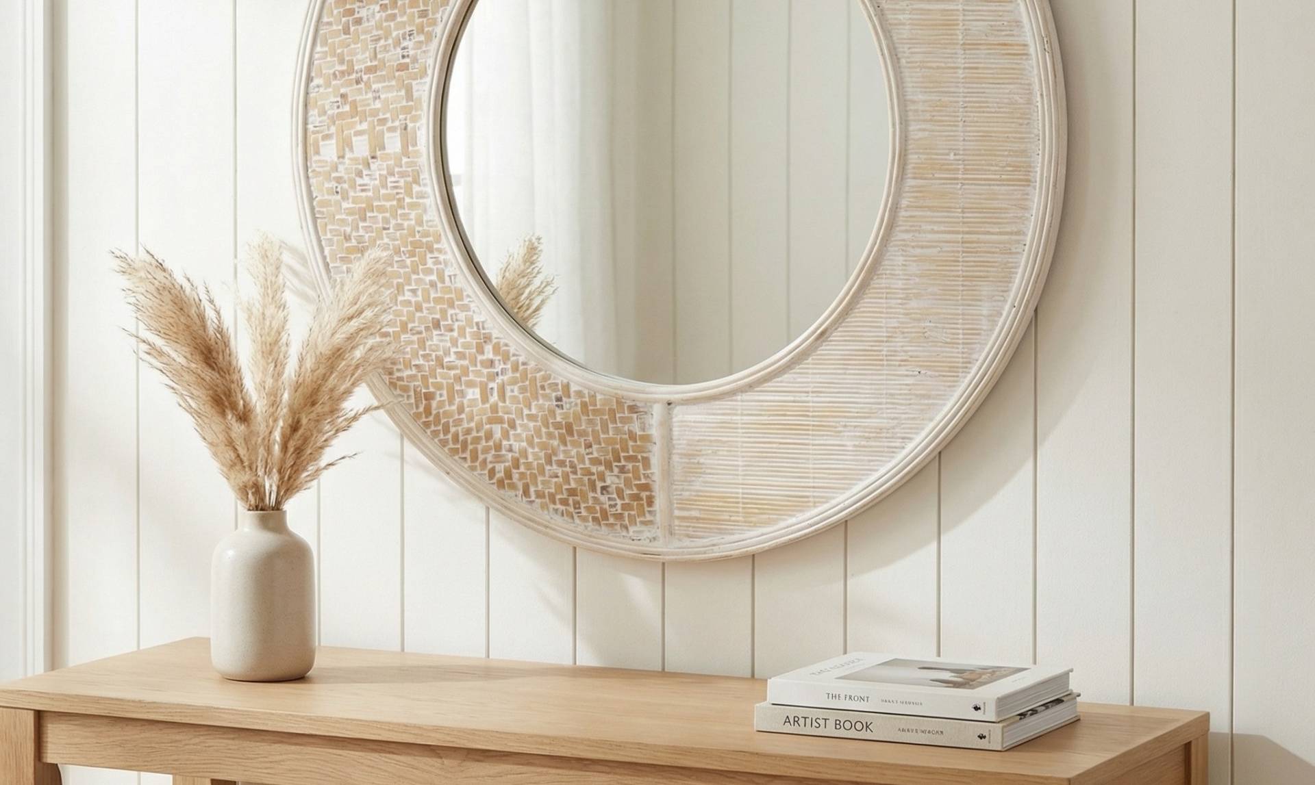 Large floor-standing and wall-mounted mirrors to reflect a bright room